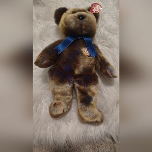 Classic Brown Teddy Bear with Blue Bow and Plush Fur